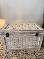 Vintage Indian storage chest made of wood with a bleached white hand-painted finish and woven rattan-style panels on the exterior