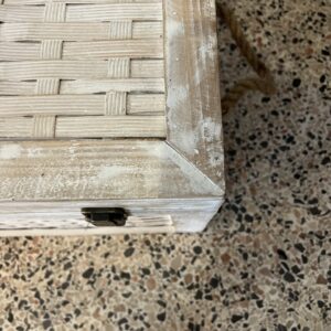 Vintage Indian storage chest made of wood with a bleached white hand-painted finish and woven rattan-style panels on the exterior