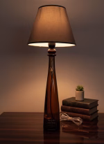 Handmade side lamp crafted from a Don Julio repurposed spirit bottle with a fabric lampshade, displayed as unique sustainable lighting decor