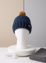 Hand-stitched Sufbeanie made from soft grey alpaca and sheep wool blend, showcasing a unique knit pattern and high-quality handmade craftsmanship