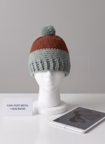 Hand-stitched Sufbeanie made from soft grey alpaca and sheep wool blend, showcasing a unique knit pattern and high-quality handmade craftsmanship