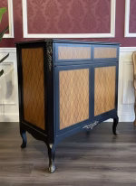Vintage Regency-style accent cabinet with black lacquered finish and intricate geometric wood inlay marquetry, 90cm wide luxury storage chest