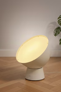 Large white Ola Wihlborg eyeball floor lamp with a tilted globe design and steel base, a collector's piece of Scandinavian Modern furniture