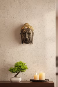 Hand-carved wooden Buddha head wall sculpture with gold and red painted details and a distressed antique finish, ideal for Zen or meditation room decor