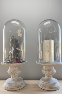 Extra tall 68cm glass bell jar with a rustic distressed base, featuring mouth-blown glass with artisanal air bubbles, styled as a tabletop centerpiece