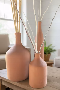 Support local craft with our hand-turned Lebanese terracotta vases. Available in three sizes, these raw artisan pottery pieces are perfect for Mediterranean and minimalist interiors. Shop the collection at Rockfort Boutique.