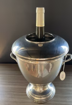 Baroque brand silver-plated champagne ice bucket with mirrored finish and professional sommelier lid on a luxury dining table