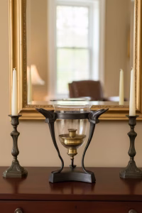 Luxury Neoclassical bronze candle holder featuring three dolphins supporting a glass hurricane shade, 27cm tall French Empire style decor