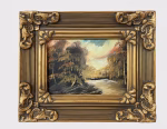 Small landscape oil-style painting in a highly detailed ornate gold Baroque frame, featuring a misty mountain stream, styled on a dark wood library shelf