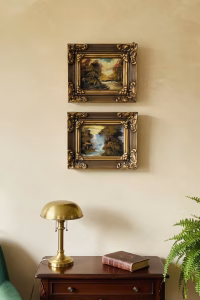 Elevate your walls with these 26cm ornate gold-framed landscape paintings. Featuring classical nature scenes in a Baroque-style frame, these artworks are perfect for Dark Academia interiors in Lebanon. Shop the pair at Rockfort Boutique.