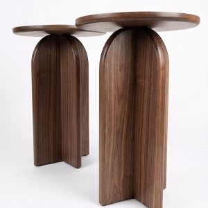 Handmade solid walnut side table featuring a smooth round top and a unique sculptural architectural base from RockFort design store in Lebanon.