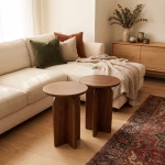 Handmade solid walnut side table featuring a smooth round top and a unique sculptural architectural base from RockFort design store in Lebanon.
