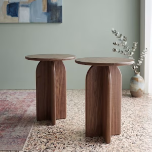 Handmade solid walnut side table featuring a smooth round top and a unique sculptural architectural base from RockFort design store in Lebanon.