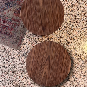 Handmade solid walnut side table featuring a smooth round top and a unique sculptural architectural base from RockFort design store in Lebanon.