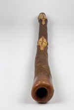 Authentic handcrafted Aboriginal didgeridoo signed by Tulklana Kumbi with intricate traditional carvings and wood-burned animal motifs from RockFort Lebanon