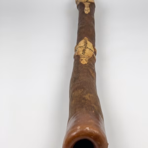 Authentic handcrafted Aboriginal didgeridoo signed by Tulklana Kumbi with intricate traditional carvings and wood-burned animal motifs from RockFort Lebanon