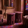 Pair of vintage Damascus style side tables featuring intricate hand-carved wood and iridescent mother of pearl inlays from RockFort Lebanon.