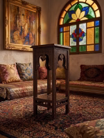 Two-tier hand-carved Damascus style pedestal table featuring a dark patina wood finish, square top, and detailed geometric relief carvings from RockFort Lebanon.