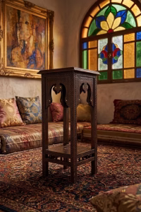 Two-tier hand-carved Damascus style pedestal table featuring a dark patina wood finish, square top, and detailed geometric relief carvings from RockFort Lebanon.