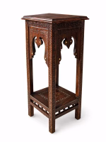 Two-tier hand-carved Damascus style pedestal table featuring a dark patina wood finish, square top, and detailed geometric relief carvings from RockFort Lebanon.