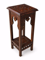 Two-tier hand-carved Damascus style pedestal table featuring a dark patina wood finish, square top, and detailed geometric relief carvings from RockFort Lebanon.