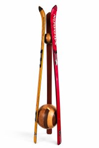 Sustainable repurposed ski coat hanger standing on a handcrafted solid wood base with a matching wooden top joint from RockFort boutique in Lebanon.