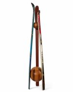 Sustainable repurposed ski coat hanger standing on a handcrafted solid wood base with a matching wooden top joint from RockFort boutique in Lebanon.