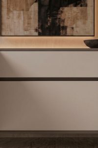 Modern linear ribbed sideboard in light charcoal grey featuring a vertical fluted exterior and matte black solid wood legs from RockFort Lebanon.