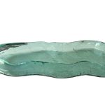 Crystal green freeform cast glass centerpiece tray with an organic wavy rim and textured finish from RockFort Lebanon.