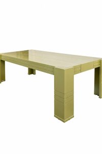 Olive green solid wood rectangular coffee table with thick block legs and horizontal grooved line details from RockFort Lebanon.