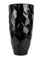 Tall glossy black faceted ceramic floor vase reflecting light across its geometric crystal surface from RockFort Lebanon.