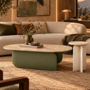 Travertine-effect coffee table with curved olive green base and cream side table styled in a warm modern living room from RockFort Lebanon.