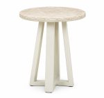 Round travertine-effect side table on a cream angled cross-leg base from RockFort Lebanon.
