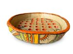 Hand-painted papier-mâché bowl with Indian Warli tribal motifs, an orange rim and raised red polka dots in the centre from RockFort Lebanon.