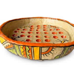 Hand-painted papier-mâché bowl with Indian Warli tribal motifs, an orange rim and raised red polka dots in the centre from RockFort Lebanon.
